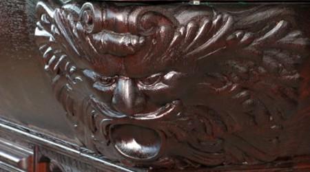 Detailed carvings of W.H. Griffith billiards table