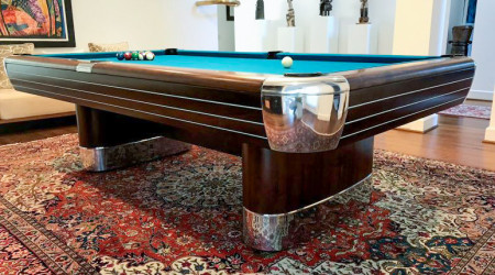 A fully restored The Anniversary antique billiard/pool table ready for play
