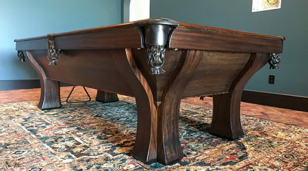 A beautifully restored antique Rochester billiard table