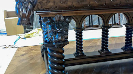 The leg of a fully restored The Lille pool table