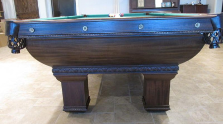 One end of The Saratoga, a fully restored antique billiard/pool table