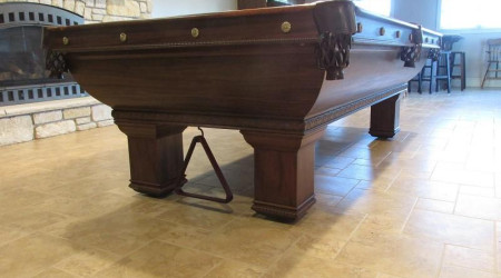 End and corner of a fully restored The Saratoga billiard table