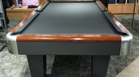 A fully restored antique "The Sport King" billiard table