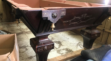 The corner of an H.W. Collender Incised billiard table