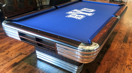 A restore Centennial pool table with BYU felt