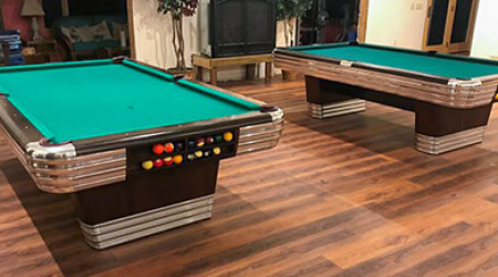 Two restored Centennial billiard tables