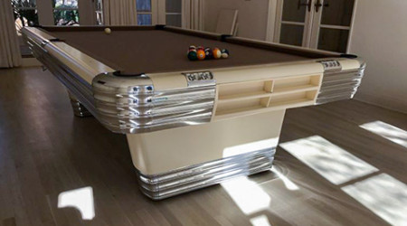 An antique Centennial restored billiard/pool table