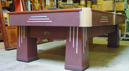 An antique Challenger billiards table