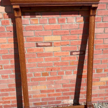 An antique 12 cue babcock rack