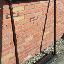 An antique 14 slot 1850s billiard cue rack