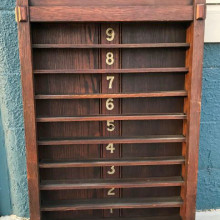 An antique Mission B ball rack