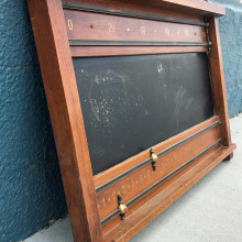 One side of an antique snooker scorekeeper